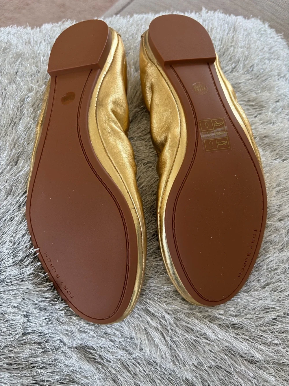 Tory Burch sleek metallic